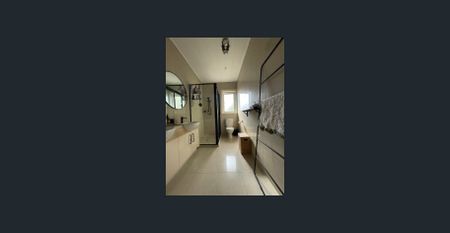 Stylish Art Deco Elegance with Modern Renovation in Prime Elwood Location - Photo 2