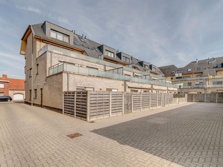 Een appartement op de 1ste verdieping rechts met 2 slaapkamers, terras, garage en autostaanplaats. - Foto 5