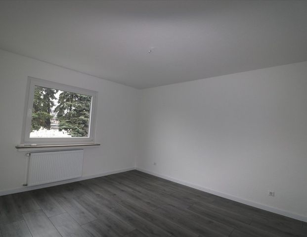 NEST FÜR SINGLES UND PAARE MIT GARTENNUTZUNG UND STELLPLATZ, 2-ZI-Whg. 1.ET in St. Tönis - Foto 1