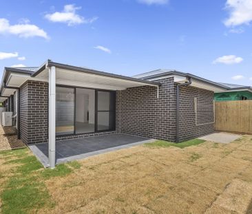 Modern Family Home with Fenced Backyard - Photo 3