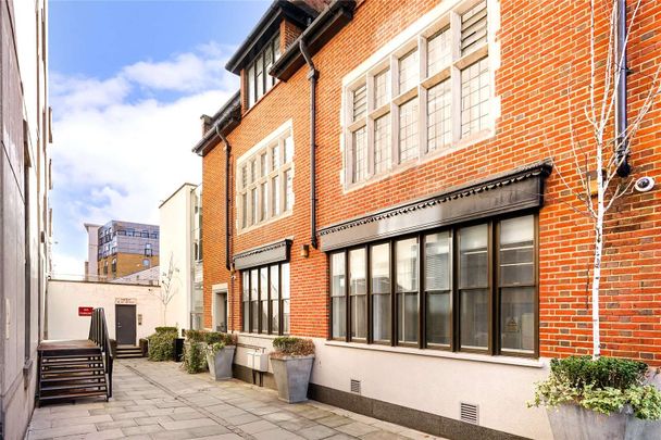 Self contained one bedroom apartment located in the historic 'Bell Building'. Now available fully furnished. - Photo 1