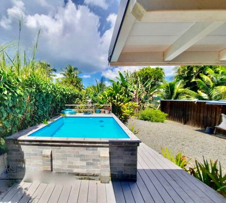 À LOUER CHARMANTE MAISON MITOYENNE F4 AVEC JARDIN ET PISCINE À BAIE-MAHAULT - Photo 4