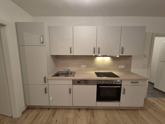 Geförderte Neubau-Wohnung mit Balkon im 3. Stock - Foto 1