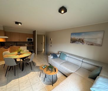 Ongemeubeld 2 slaapkamer appartement met achterkoer - Photo 1