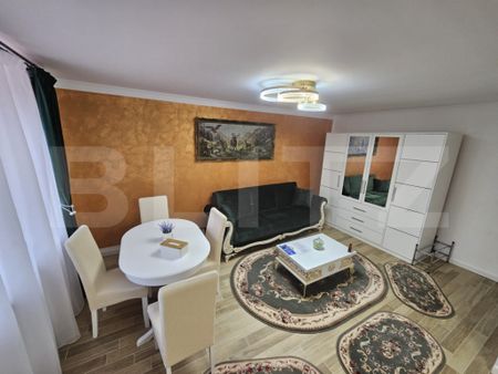 Apartament cu 3 camere de închiriat, 70 mp, zona Centru, Al - Fotografie 2