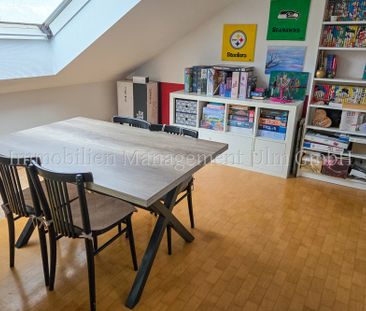 Stilvolle 2-Zimmer-Dachgeschosswohnung mit Münsterblick! - Photo 1