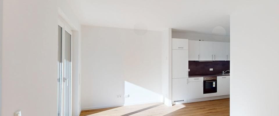 Helle 2-Zimmer Erdgeschosswohnung mit EBK und Südterrasse - Foto 1