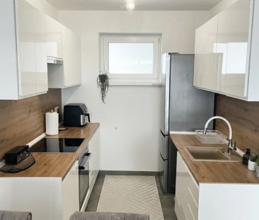 Moderne 2-Zimmer-Gartenwohnung Top 4 mit Balkon im Föhrenpark Wels - Photo 1