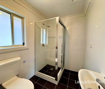 Modern two-bedroom home with water included - Photo 5