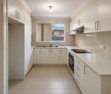 WELL PRESENTED HOME CLOSE TO EVERYTHING! - Photo 2