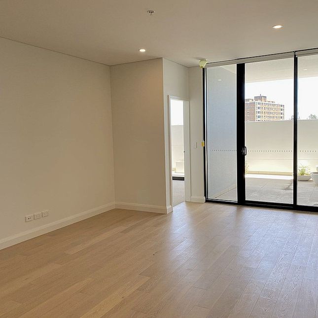 Near NEW Stunning 2 Bedrooms 2 Bathroom Plus Study Apartment Short Stroll to Granville Train Station - Photo 1