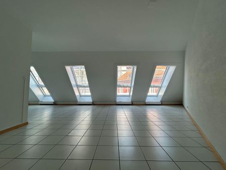 Au cour de la ville - Appartement mansardé de 4.5 pièces - Photo 5