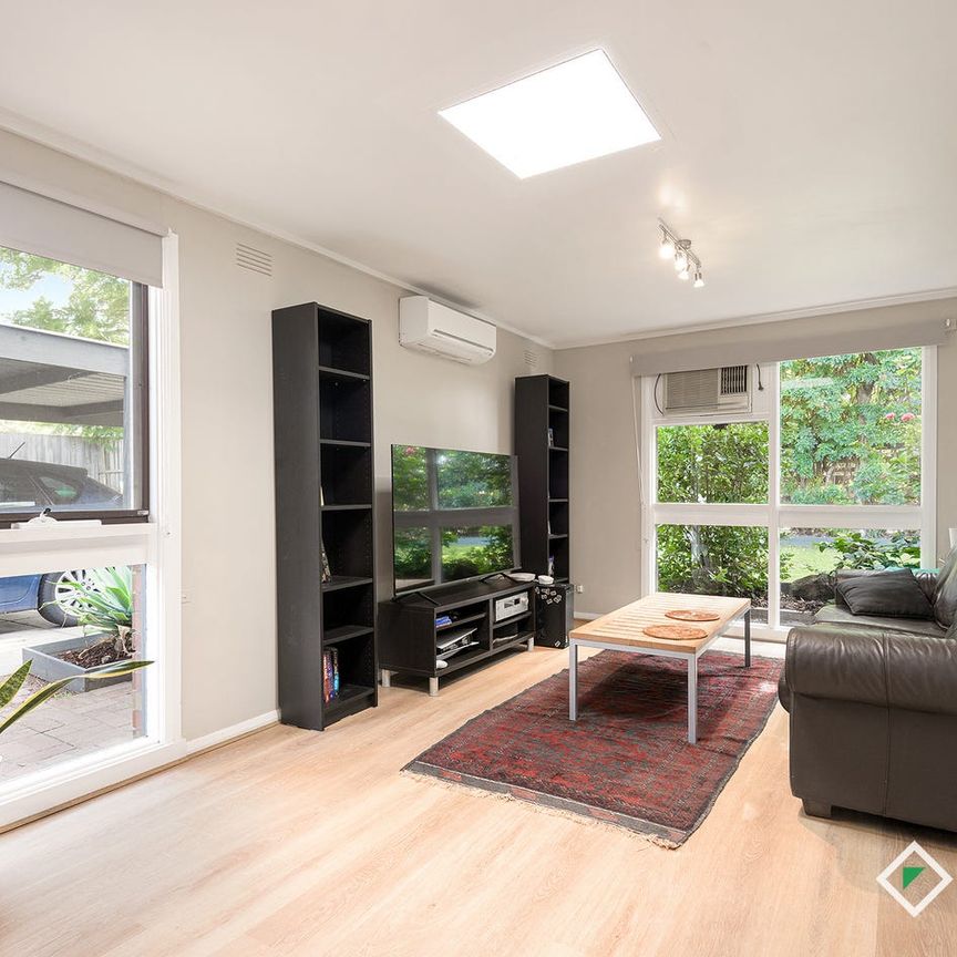 Charming 3-Bedroom Home with Two Living Areas - Photo 1