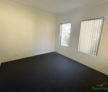 Central Three-Bedroom Unit with Ensuite and Private Courtyard - Photo 3