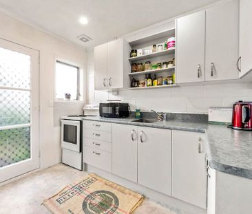 Spacious 2-Bedroom | Great Location & Convenience - Photo 3