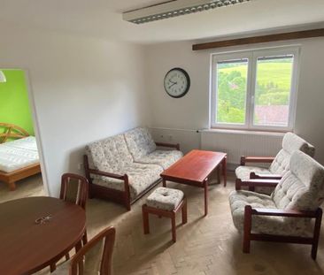Pronájem bytu 2+1 54 m², Mlýnce, Vroutek - Fotografie 1