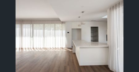 Executive Living with Designer Finishes in Sought-After Locale! - Photo 5