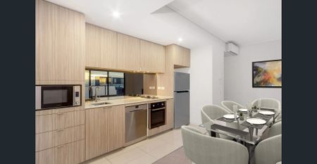 Unique One Bedroom Apartment + Study with District Views - Photo 3