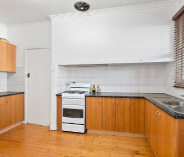 LIGHT FILLED AND SPACIOUS! - Photo 2