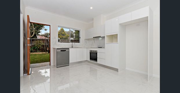 Near new street-facing! - Photo 1