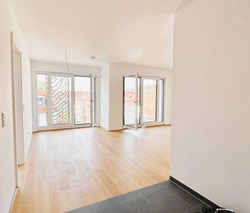 Ganz fein & funkelnagelneu: mit sonniger Dachterrasse und Einbauküche! - Foto 1