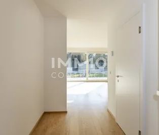 Exklusiver Erstbezug! 2 Zimmer mit südlichem Balkon und Blick ins Grüne! - Photo 2