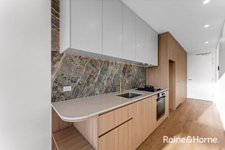 Contemporary Living with Balcony Views & Top Convenience - Photo 4