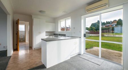 Sunny and solid home in Halfway Bush - Photo 2