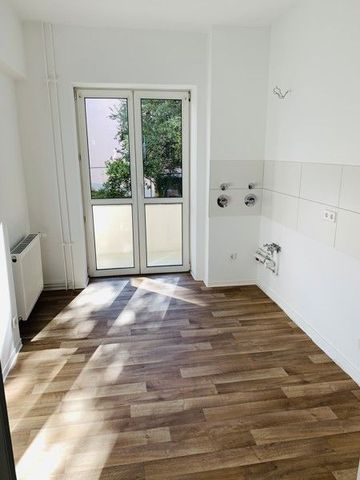 Frisch renoviert mit modernem Tageslichtbad! - Foto 5