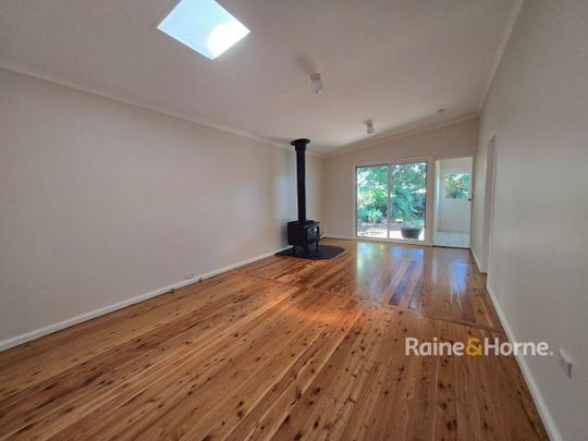 RENOVATED GEM WITH TWO LIVING AREAS - Photo 1