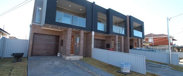 NEAR NEW TRIPLEX!! - Photo 1