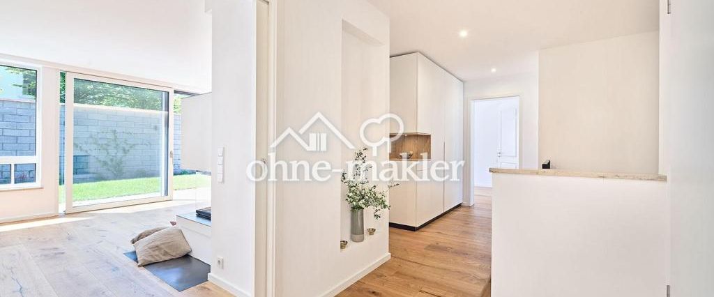 Moderne extravagante Wohnung auf zwei Ebenen mit Atriumgarten - Photo 1