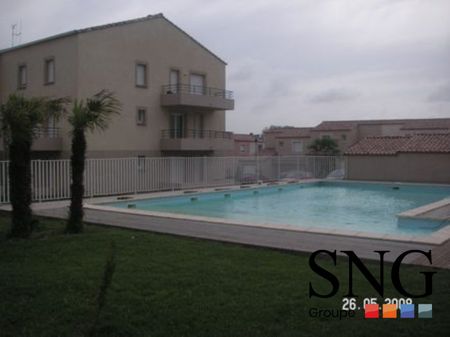 T3 AVEC PARKING ET ACCES PISCINE DANS RESIDENCE - Photo 2