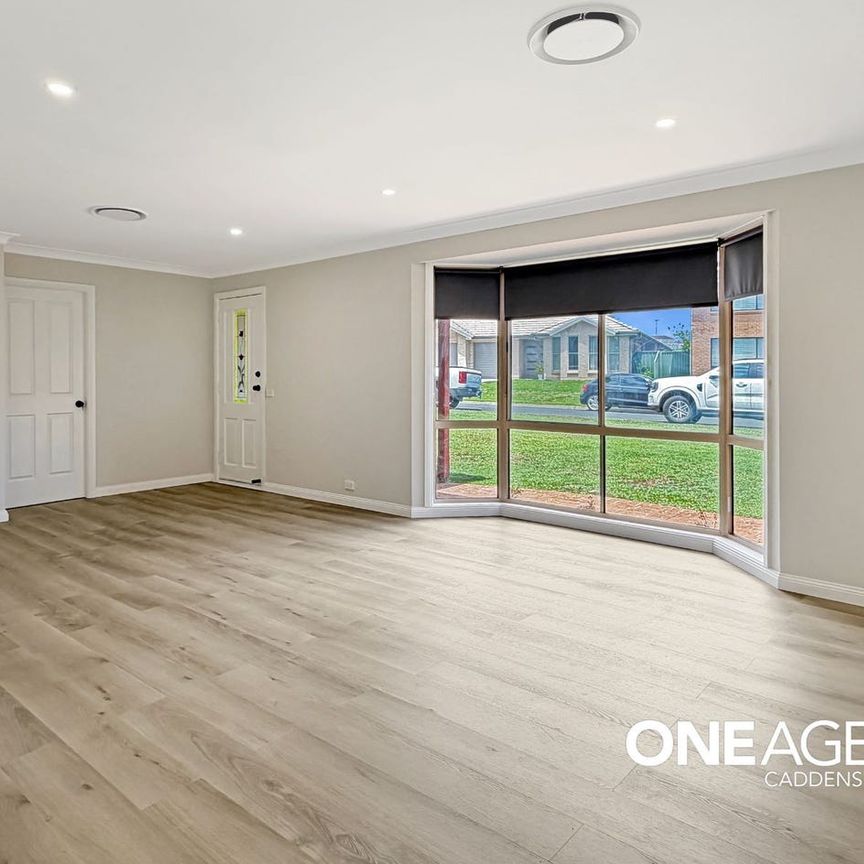 RENOVATED AND SPACIOUS HOME IN PEACEFUL, CUL-DE-SAC LOCATION!!! - Photo 1