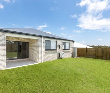 A Peaceful Spacious Suburban Home with Solar! - Photo 1