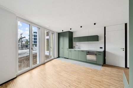 Attraktive und charmante Neubauwohnung mit Sitzplatz an bester Lage - Foto 4