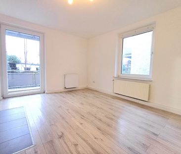 Zentrale Erdgeschosswohnung mit Balkon! - Photo 1