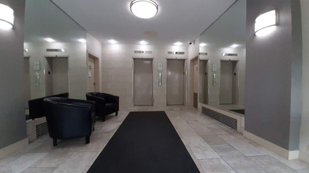 Downtown Apartment Building - Photo 1