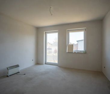 Eine Neubauwohnung mit einem sehr großen Garten und einer tollen Te... - Photo 2