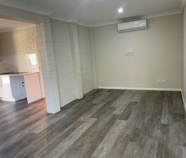 Low Maintenance Unit - Photo 1