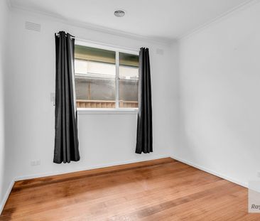 Charming 3-Bedroom Home with Large Fenced Yard and Prime Location - Photo 6