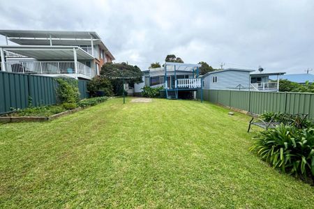 Cozy 2-Bedroom Home with Large Backyard & Covered Deck! - Photo 3