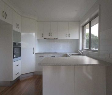 Stylish Four-Bedroom Home with Contemporary Features - Photo 1