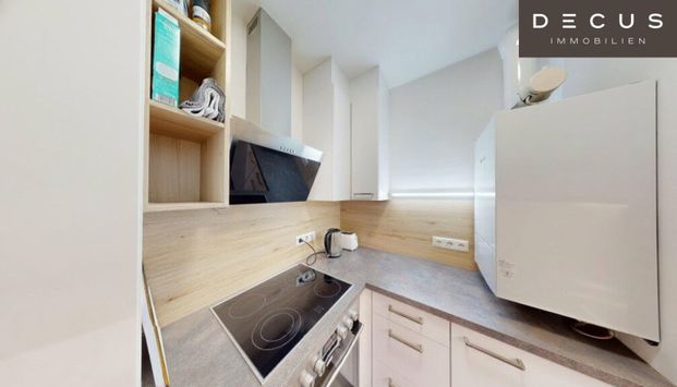 CHARMANTE DG-WOHNUNG MIT TERRASSE | SAUNA & GARAGE | WESTSEITIGE INNENHOFLAGE | AB SOFORT - Photo 1