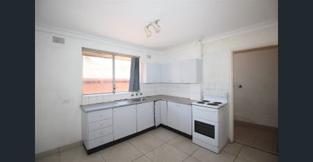 TWO BEDROOM TOP FLOOR UNIT WITH GARAGE - Photo 5