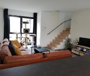 Gezellig duplexappartement met 2 slaapkamers van 104 m². - Photo 2