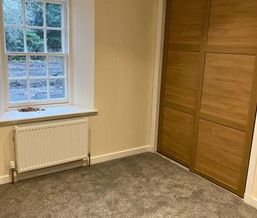 A well-presented two-bedroom semi-detached cottage situated in an a... - Photo 4