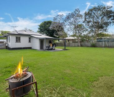 PRIME LOCATION WITH SPACIOUS YARD!! - Photo 1