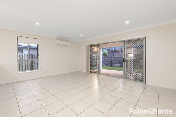 Beautifully Lanscaped Coomera Family Home - Photo 1