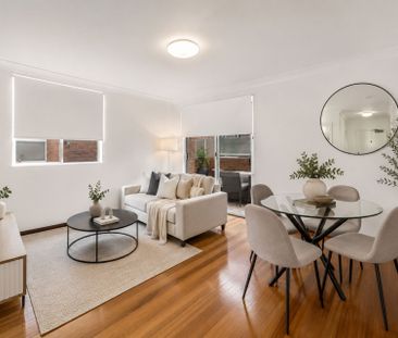 Stylish Full-Brick Apartment with Lock-Up Garage - Photo 1